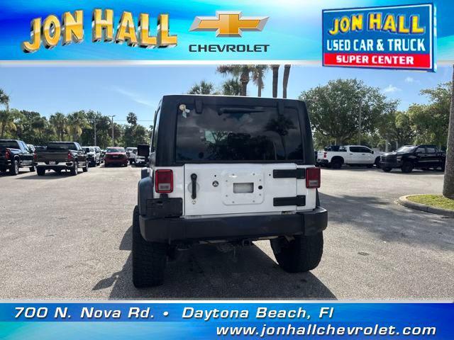 used 2015 Jeep Wrangler Unlimited car, priced at $13,978