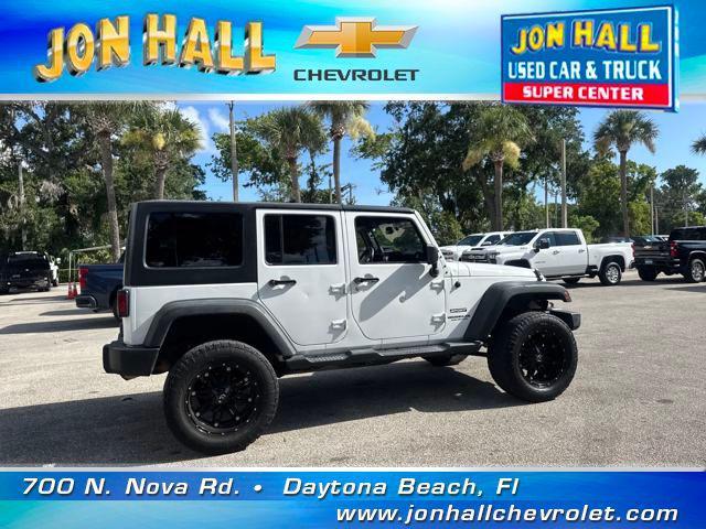 used 2015 Jeep Wrangler Unlimited car, priced at $13,978