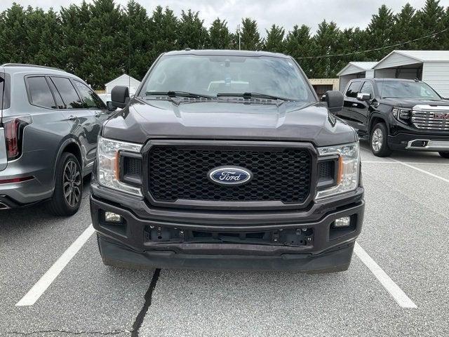 used 2019 Ford F-150 car, priced at $23,611
