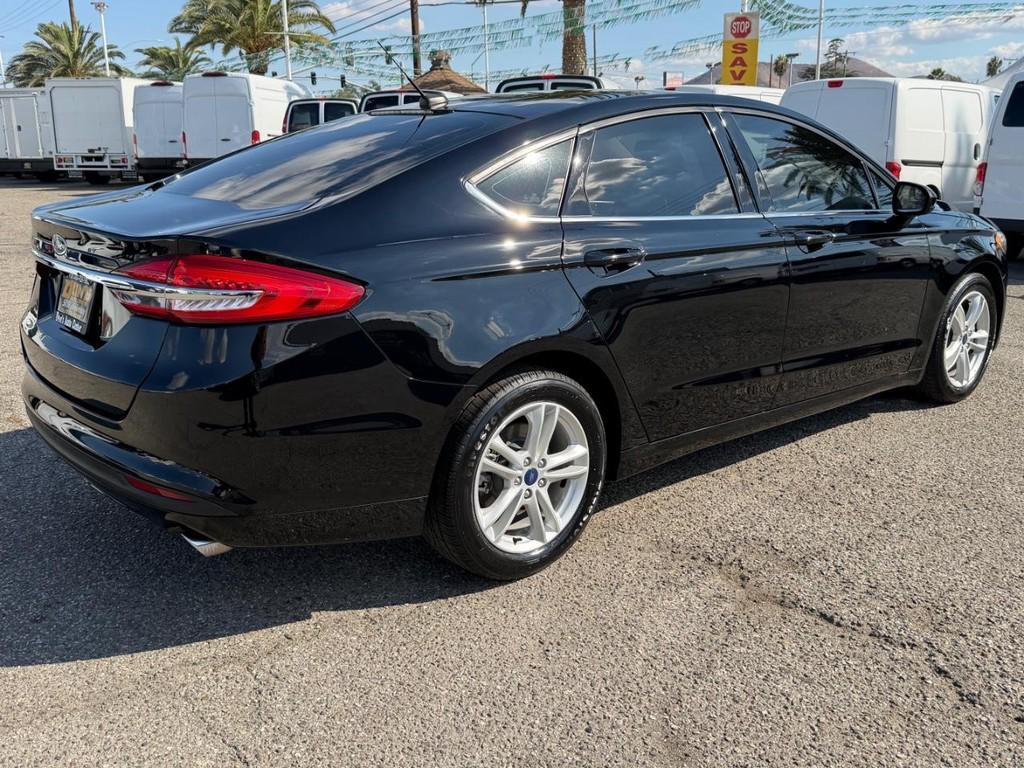 used 2018 Ford Fusion car, priced at $10,820