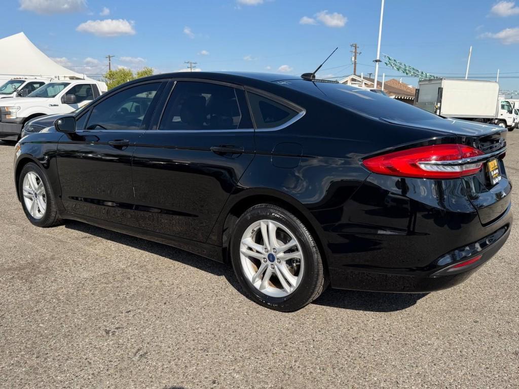 used 2018 Ford Fusion car, priced at $10,820
