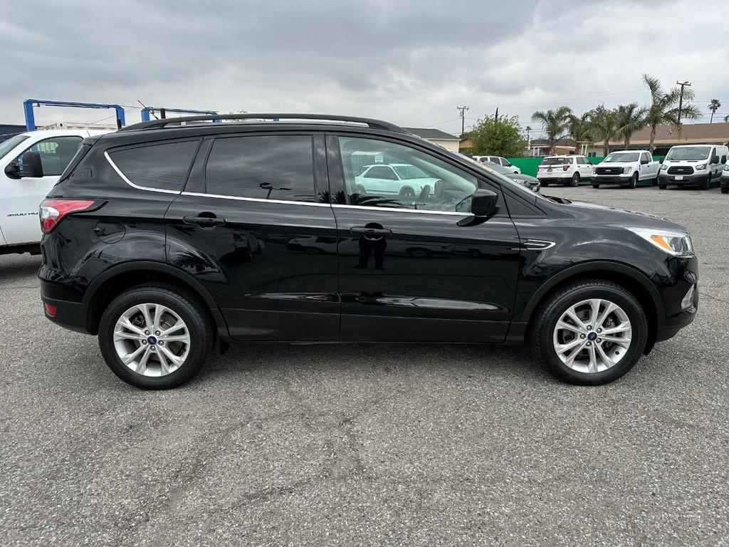 used 2018 Ford Escape car, priced at $11,888