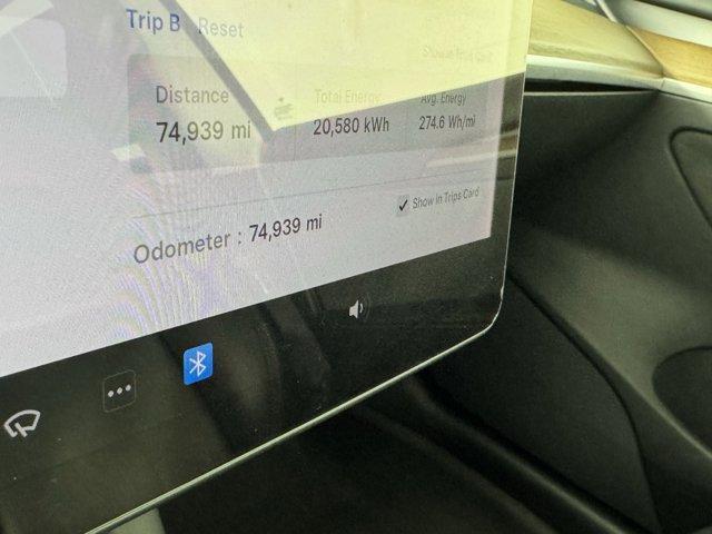 used 2022 Tesla Model 3 car, priced at $21,000