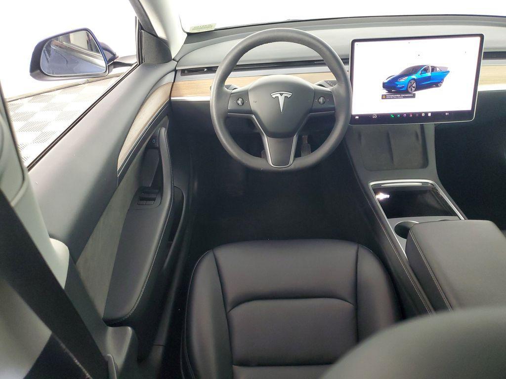 used 2023 Tesla Model 3 car, priced at $20,700