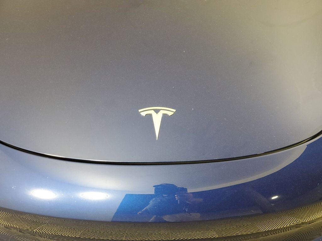 used 2023 Tesla Model 3 car, priced at $20,700