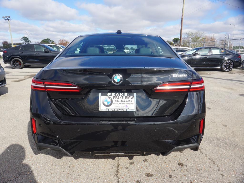 new 2025 BMW 530 car, priced at $65,855