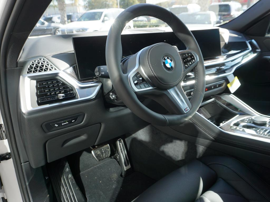 new 2025 BMW X6 car, priced at $77,875