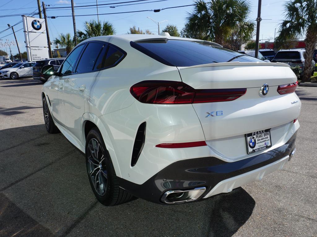 new 2025 BMW X6 car, priced at $77,875