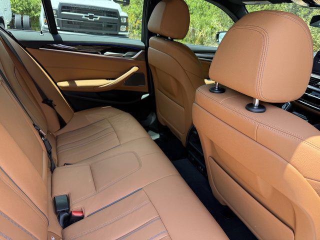 used 2023 BMW 530e car, priced at $38,588