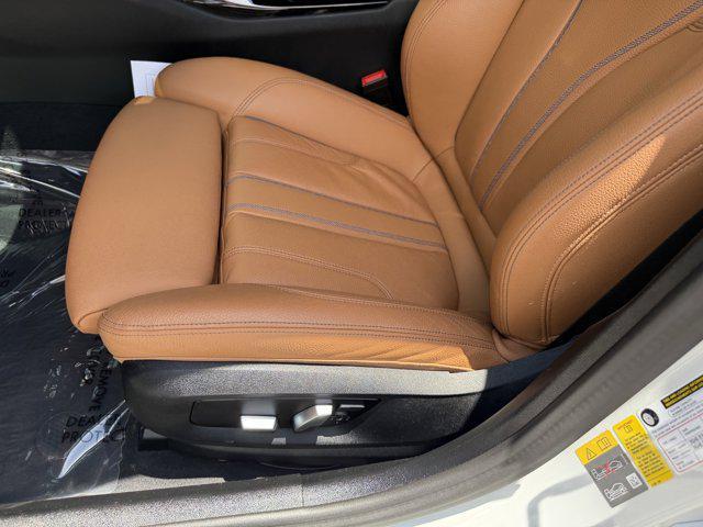 used 2023 BMW 530e car, priced at $38,588