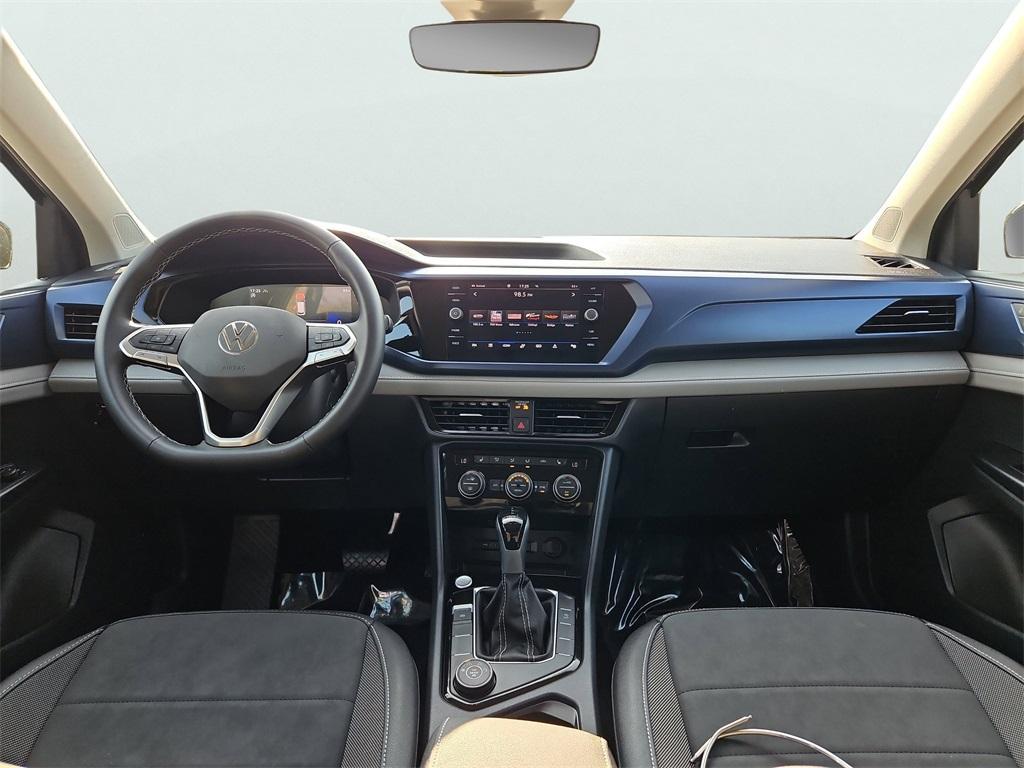 used 2024 Volkswagen Taos car, priced at $27,499