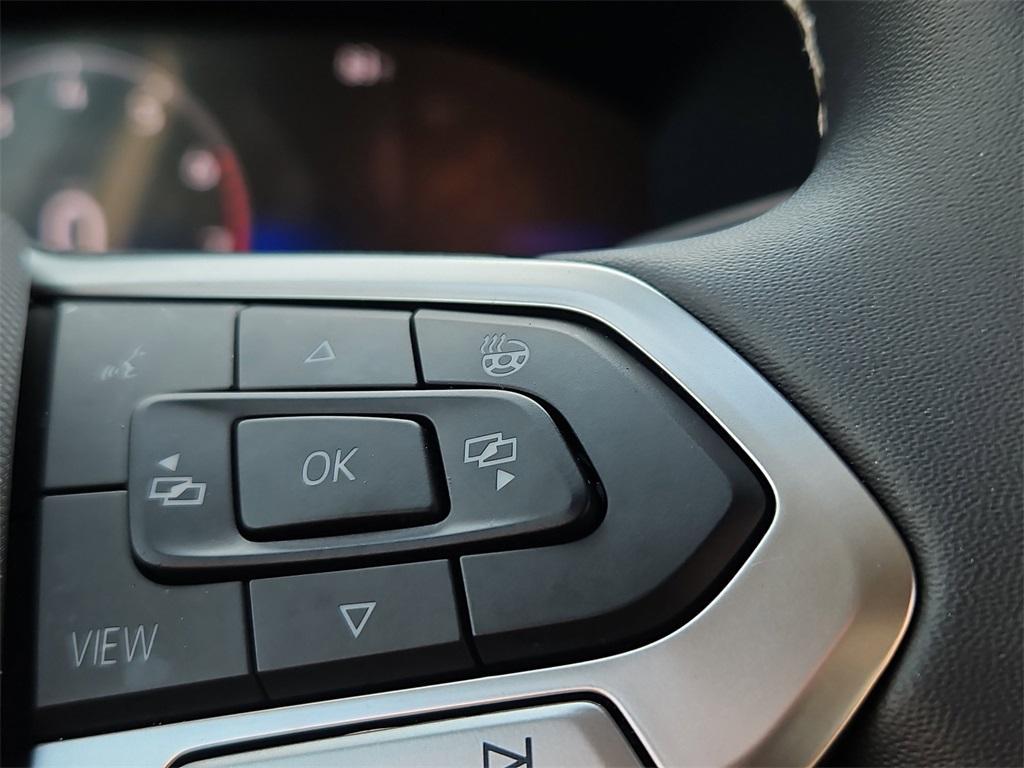used 2024 Volkswagen Taos car, priced at $27,499