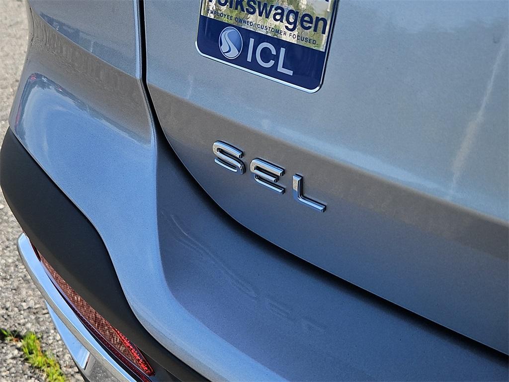 used 2024 Volkswagen Taos car, priced at $31,499