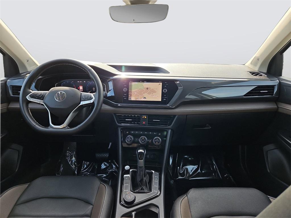 used 2024 Volkswagen Taos car, priced at $31,499