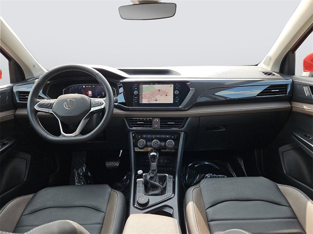 used 2024 Volkswagen Taos car, priced at $29,999