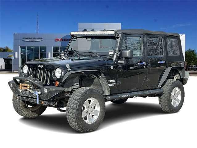 used 2011 Jeep Wrangler Unlimited car, priced at $13,990