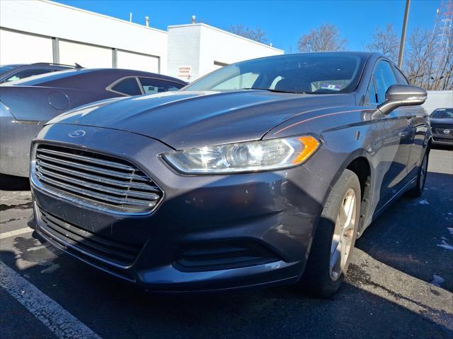 used 2014 Ford Fusion car, priced at $10,594