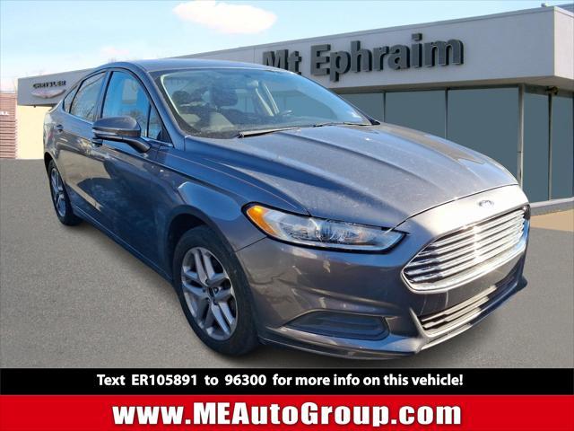 used 2014 Ford Fusion car, priced at $10,594