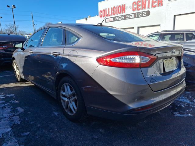 used 2014 Ford Fusion car, priced at $10,594