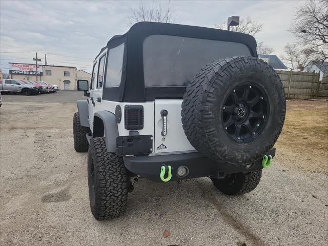 used 2016 Jeep Wrangler Unlimited car, priced at $27,489