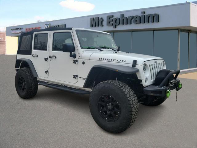 used 2016 Jeep Wrangler Unlimited car, priced at $25,581