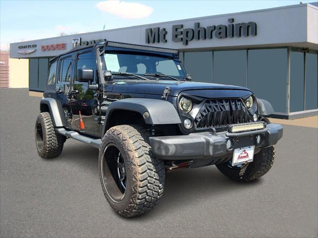 used 2016 Jeep Wrangler Unlimited car, priced at $22,190