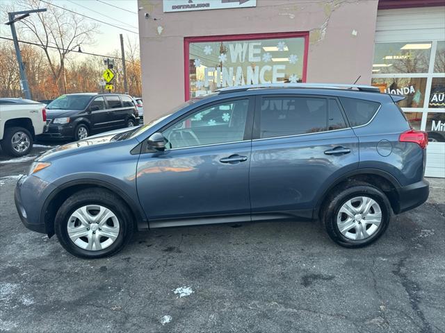 used 2014 Toyota RAV4 car, priced at $17,000