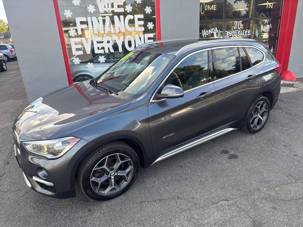 used 2016 BMW X1 car, priced at $11,000