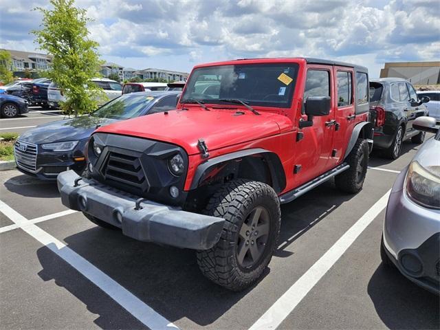 used 2016 Jeep Wrangler Unlimited car, priced at $13,791