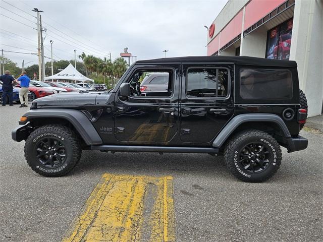 used 2021 Jeep Wrangler Unlimited car, priced at $30,877