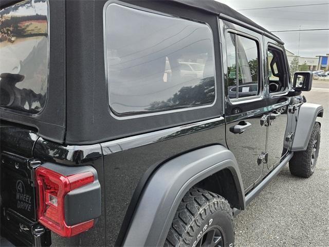 used 2021 Jeep Wrangler Unlimited car, priced at $30,877