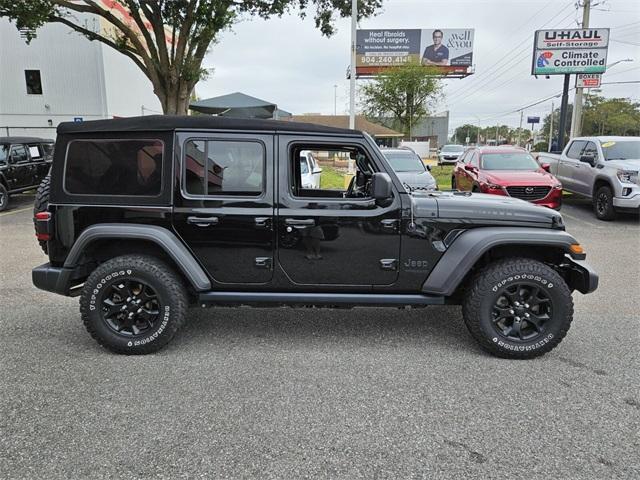 used 2021 Jeep Wrangler Unlimited car, priced at $30,877