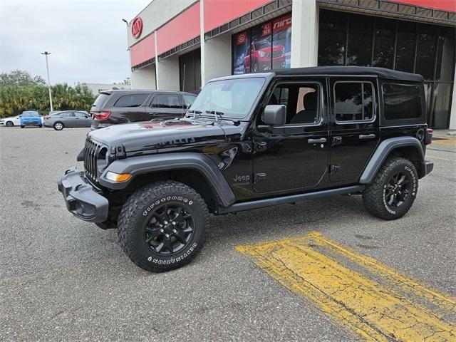 used 2021 Jeep Wrangler Unlimited car, priced at $30,877