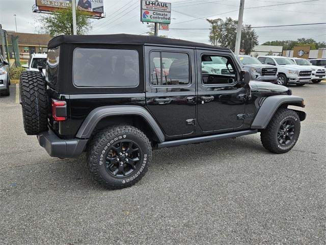 used 2021 Jeep Wrangler Unlimited car, priced at $30,877