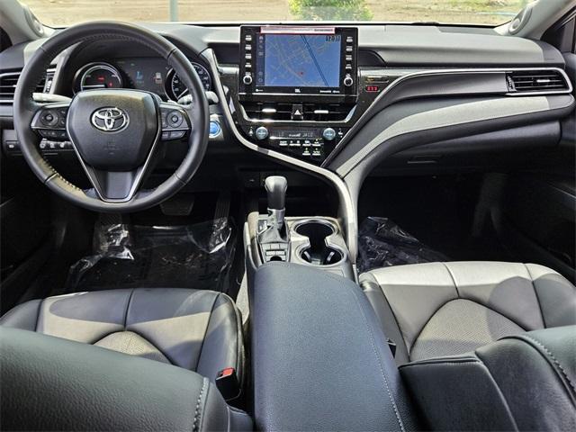 used 2024 Toyota Camry Hybrid car, priced at $32,891