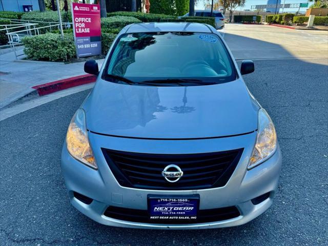 used 2014 Nissan Versa car, priced at $3,999