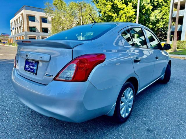 used 2014 Nissan Versa car, priced at $3,999