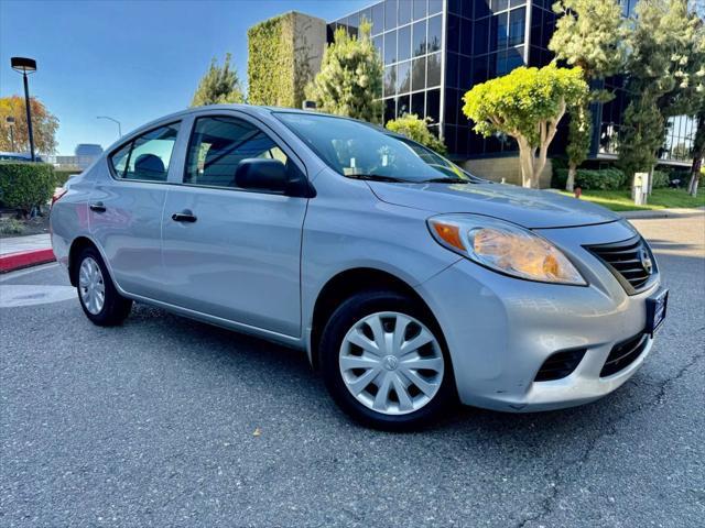 used 2014 Nissan Versa car, priced at $3,999