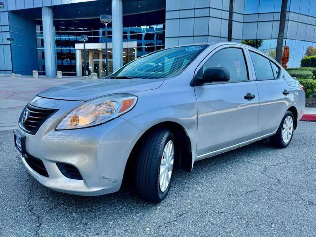 used 2014 Nissan Versa car, priced at $3,999