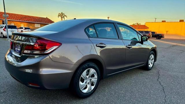 used 2015 Honda Civic car, priced at $10,999