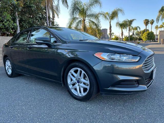 used 2015 Ford Fusion car, priced at $7,499