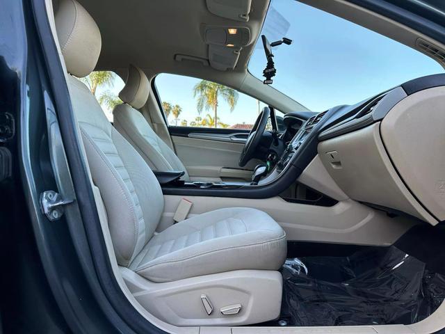 used 2015 Ford Fusion car, priced at $7,499