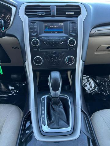 used 2015 Ford Fusion car, priced at $7,499