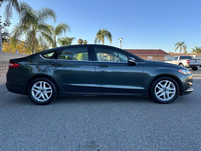 used 2015 Ford Fusion car, priced at $7,499