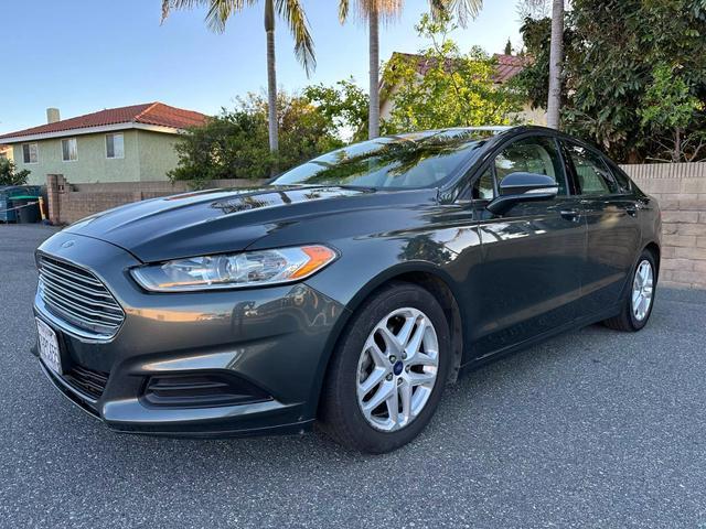 used 2015 Ford Fusion car, priced at $7,499