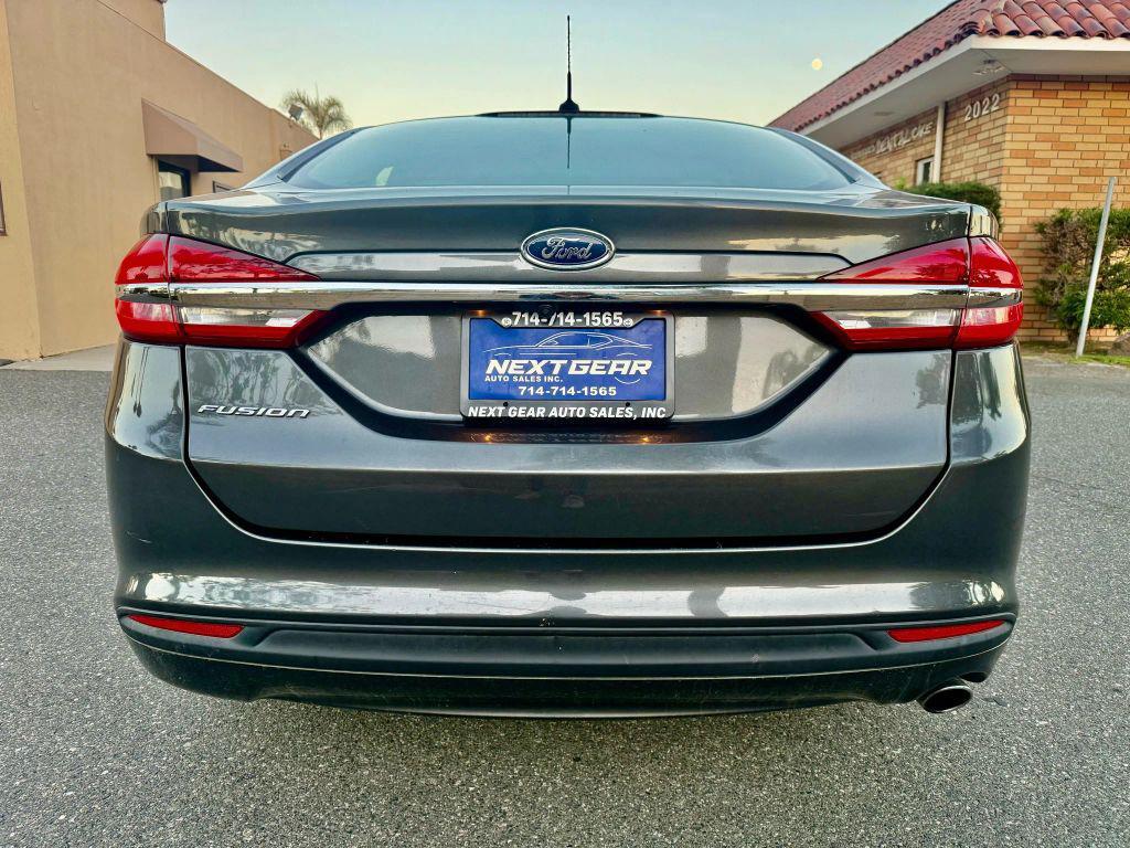 used 2018 Ford Fusion car, priced at $7,399