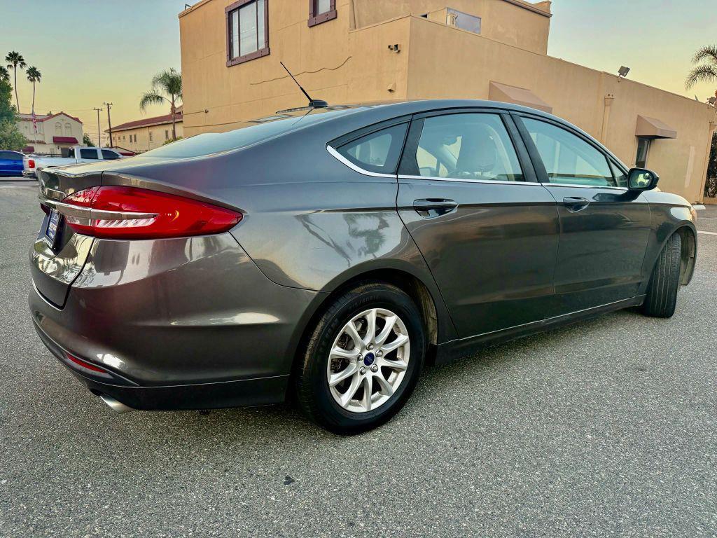 used 2018 Ford Fusion car, priced at $7,399