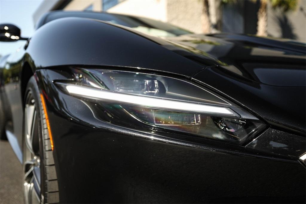 used 2024 Ferrari Roma Spider car, priced at $409,991