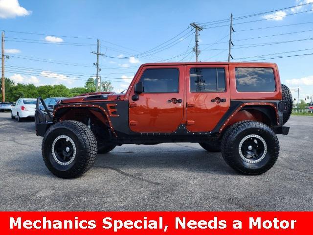 used 2014 Jeep Wrangler Unlimited car, priced at $13,000