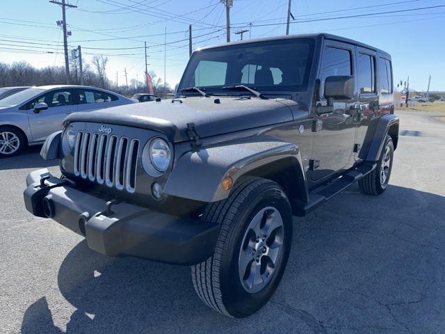 used 2016 Jeep Wrangler Unlimited car, priced at $15,597